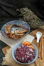 Salmon kabutoni steamed with sweet soya sauce with golden needle mushroom and sliced Ã¢â¬â¹Ã¢â¬â¹ginger served with riceberry rice Royalty Free Stock Photo